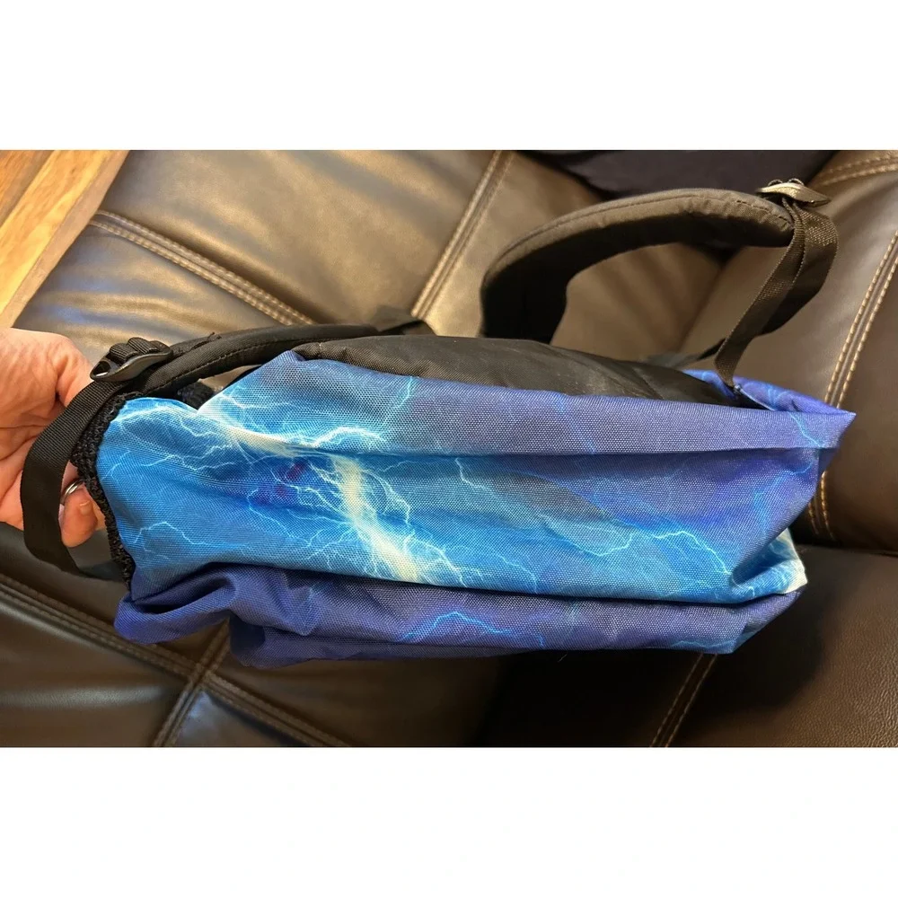NWOT JanSport Back Pack, Blue Lightening. Multi Zip Pockets